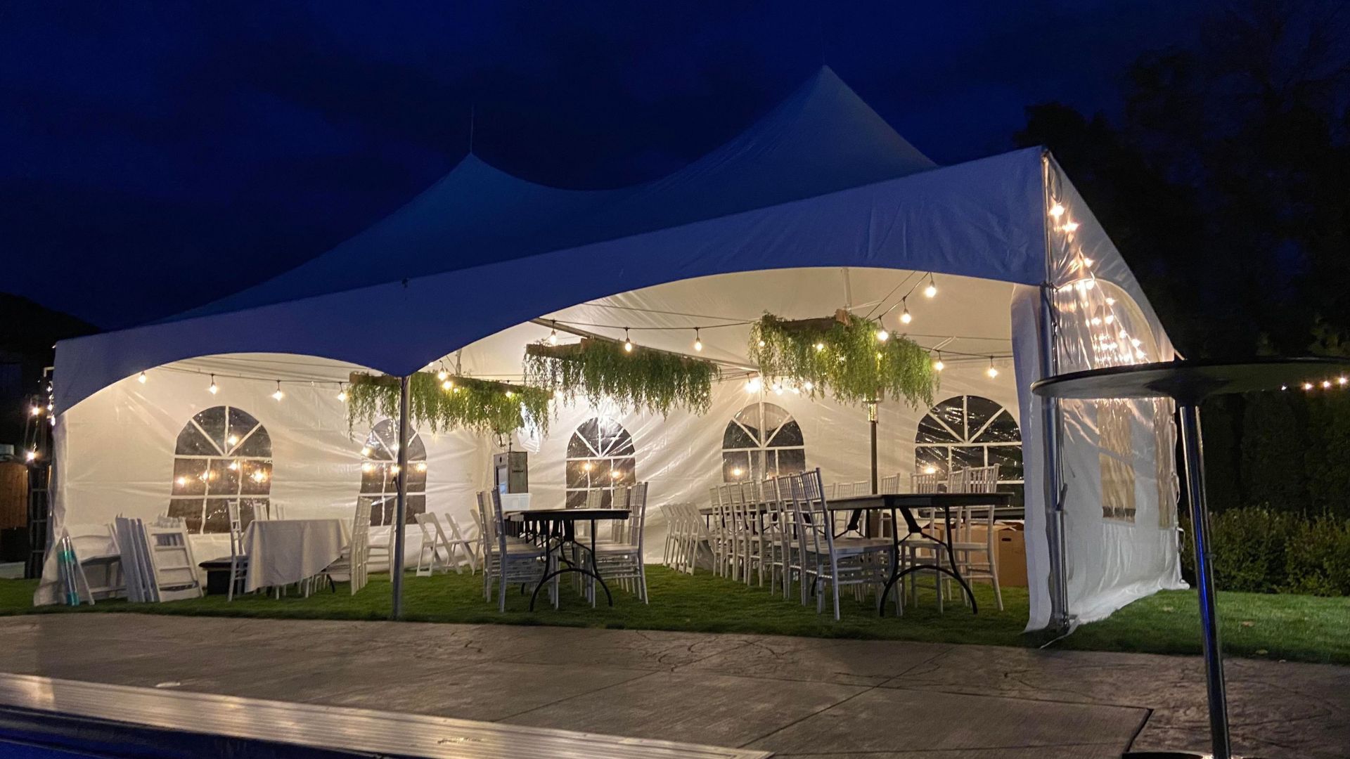10 by 20 marquee tent illuminated at night